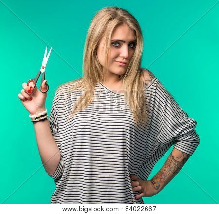 Young Woman With Scissors In Hand