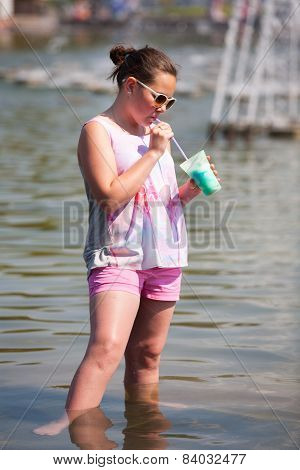 A Girl Standing In Water