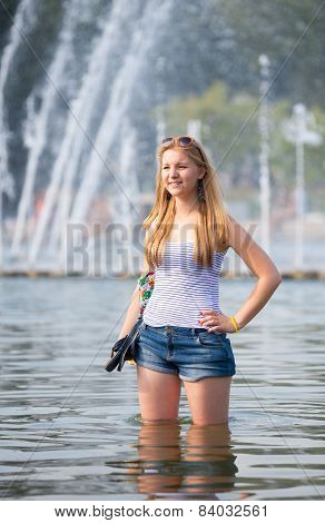 Beautiful Girl Standing In Water
