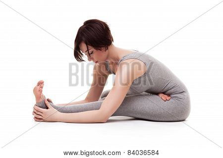 young beautiful woman yoga posing. isolated
