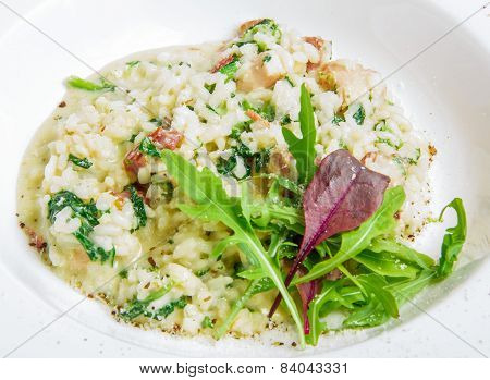 risotto with smoked meat, spinach, parmesan cheese
