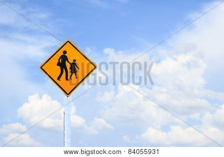 Yellow Traffic Sign With White Clouds And Blue Sky