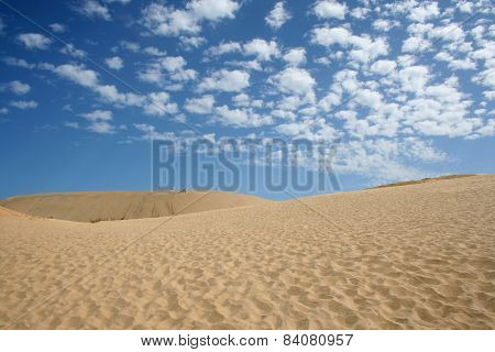 Clouds Over Sand Dunes