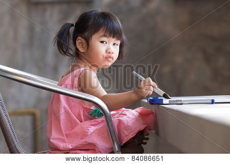 Lovely Kid Practice For Writing On White Broad Before Class Learning In Pre Kindergarten