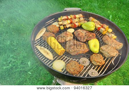 Bbq Grill With Steaks, Kebabs And Vegetables Top View