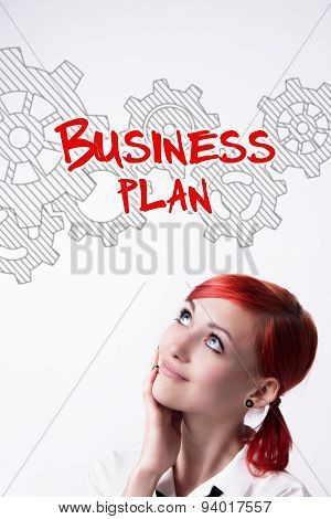 Red-haired Girl Is Developing A Business Plan