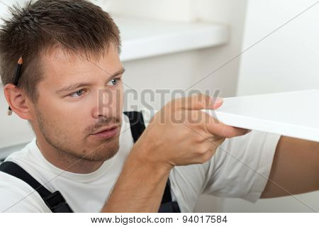 Man Assembling Furniture