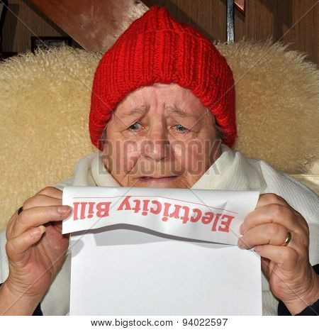 Old Lady Reading Utility Bill