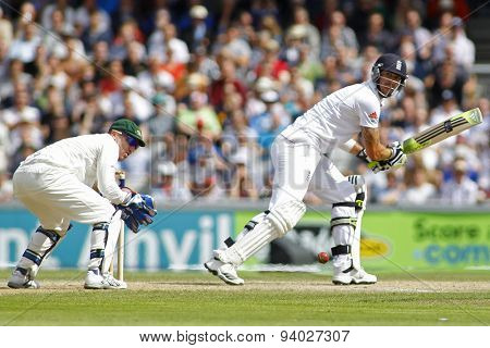 MANCHESTER, ENGLAND - August 03 2013: Brad Haddin and Kevin Pietersen during day three of  the Investec Ashes 3rd test match at Old Trafford Cricket Ground, on August 03, 2013 in London, England.