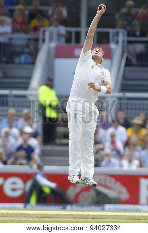 MANCHESTER, ENGLAND - August 04 2013: Ryan Harris catches the ball during day four of  the Investec Ashes 4th test match at Old Trafford Cricket Ground, on August 04, 2013 in London, England.