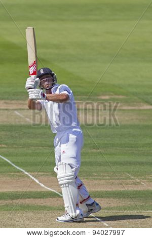 LONDON, ENGLAND - July 18 2013: Jonathan Trott hits the ball and is caught out by Usman Khawaja on day one of the Investec Ashes 2nd test match, at Lords Cricket Ground on July 18, 2013