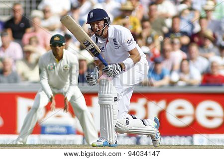 MANCHESTER, ENGLAND - August 02 2013: Usman Khawaja and Joe Root during day two of  the Investec Ashes 3rd test match at Old Trafford Cricket Ground, on August 02, 2013 in London, England.