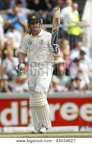 MANCHESTER, ENGLAND - August 02 2013: Brad Haddin raises his bat to acknowledge the crowd after scoring a half century during day two of  the  Ashes 3rd test match at Old Trafford Cricket Ground