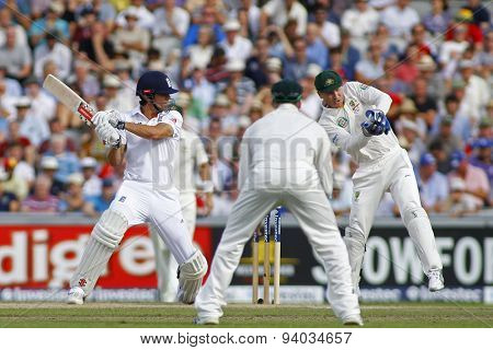 MANCHESTER, ENGLAND - August 02 2013: Alastair Cook and Brad Haddin during day two of  the Investec Ashes 3rd test match at Old Trafford Cricket Ground, on August 02, 2013 in London, England.