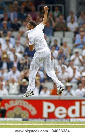 MANCHESTER, ENGLAND - August 01 2013: Tim Bresnan celebrates taking the wicket of Shane Watson during day one of  the Investec Ashes 3rd test match at Old Trafford Cricket Ground, on August 01, 2013