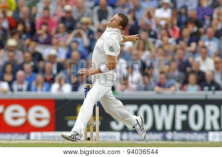 MANCHESTER, ENGLAND - August 04 2013: Peter Siddle bowling during day four of  the Investec Ashes 4th test match at Old Trafford Cricket Ground, on August 04, 2013 in London, England.