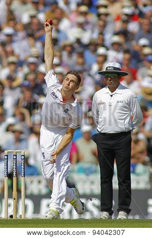 LONDON, ENGLAND - August 21 2013: Chris Woakes bowling during day one of the 5th Investec Ashes cricket match between England and Australia played at The Kia Oval Cricket Ground on August 21, 2013
