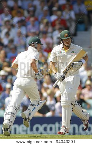 LONDON, ENGLAND - August 21 2013: Michael Clarke and Shane Watson run a single during day one of the 5th Ashes cricket match between England and Australia played at The Kia Oval Cricket Ground