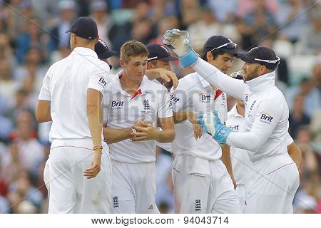 LONDON, ENGLAND - August 22 2013: England players congratulate Chris Woakes on his maiden wicket during day two of the 5th Investec Ashes cricket match between England and Australia