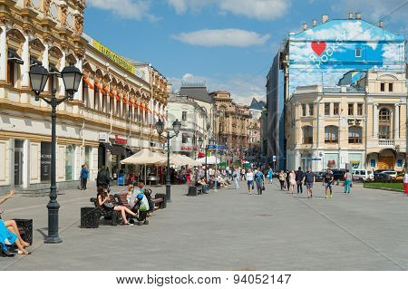 People Walking And Sitting On Benches On Kuznetsky Most Street
