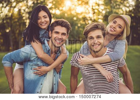 Friends Resting In Park