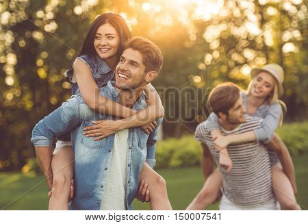 Friends Resting In Park