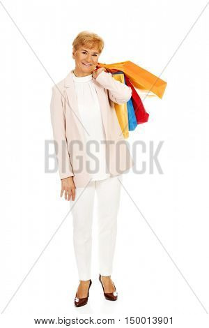 Happy business woman holging shopping bags