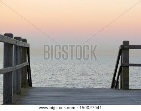Stairs on the beach in the evening