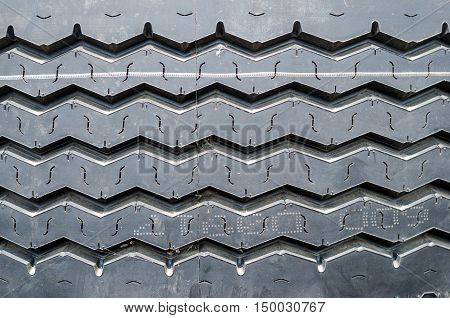 Textured pattern of a new truck tire background