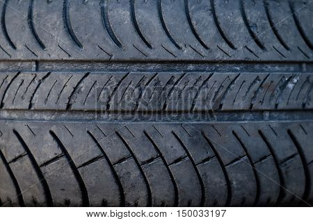 Closeup texture of a car tyre old