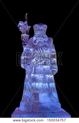 Ice sculpture of Santa Claus isolated on black background