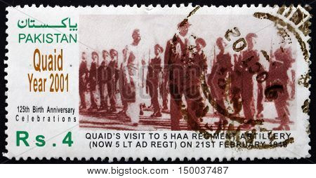 PAKISTAN - CIRCA 2001: a stamp printed in Pakistan shows Mohammed Ali Jinnah Reviewing Troops Quaid Year circa 2001