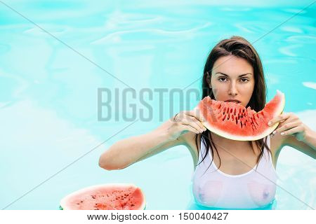 Sexy Woman With Watermelon In Pool