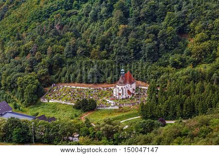 view of church with cemetery from Gottweig Abbey hill Austria