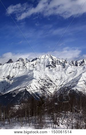 Ski Lift In Snow Mountains At Nice Winter Day