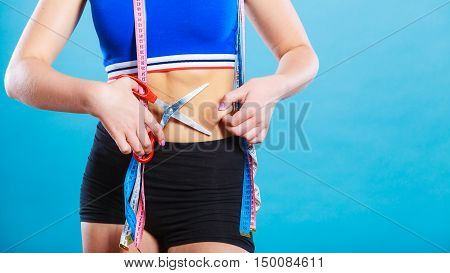 Woman Pinching Waist For Skin Fold Test