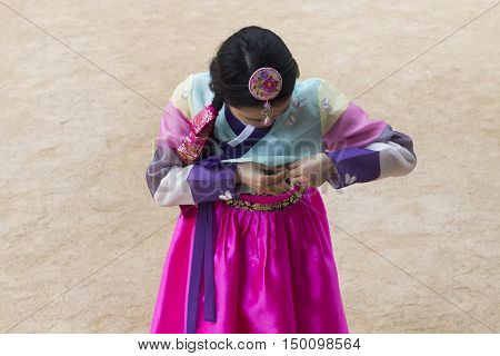 Beautiful girl in Hanbok at Gyeongbokgung, the traditional Korean dress