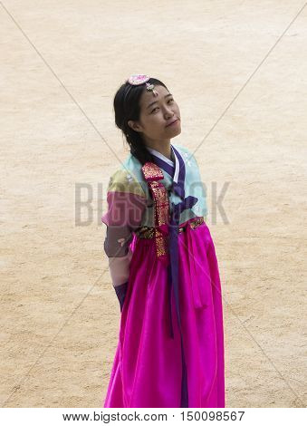 Seoul, South Korea - Sep 26, 2016: Beautiful Korean girl in traditional Hanbok dresses posing at Gyeongbokgung (Gyeongbok) Palace. The palace was the main royal palace of the Joseon dynasty