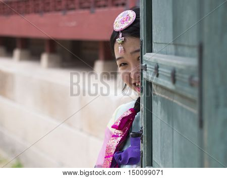 Seoul, South Korea - Sep 26, 2016: Beautiful Korean girl in traditional Hanbok dresses posing at Gyeongbokgung (Gyeongbok) Palace. The palace was the main royal palace of the Joseon dynasty