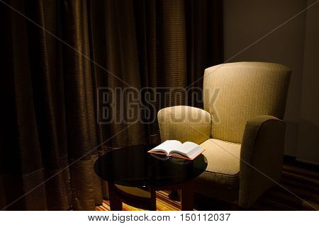 Modern Armchair and Table in a Shadow