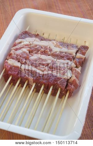 raw abbruzese mini sheep skewers called arrosticini