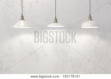 Industrial loft pendant lamps against rough wall