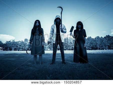Group of stranger people with weapon to prank on halloween,Scary background for book cover