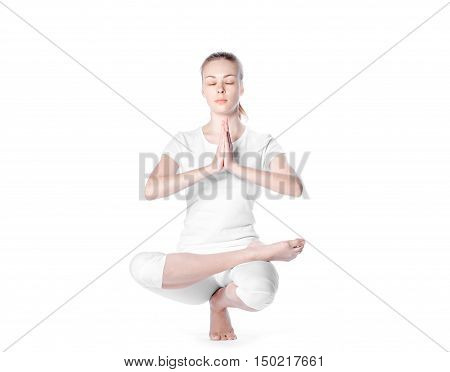 Young Blonde Woman Doing Yoga On White Background
