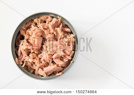 canned tuna isolated on white / Canned soy free albacore white meat tuna packed in water / open tuna tin on a white background / tuna fish isolated on white