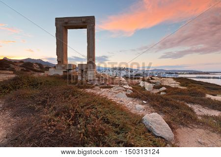 View of Portara and remains of temple of Apollo at sunrise.