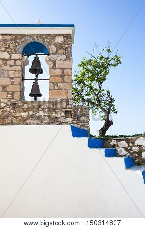 Church belfry and steps in Kos island Greece