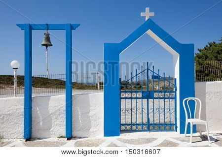 Bell and gate of church in Kos island Greece