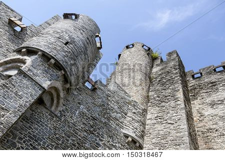 thick walls and blue sky at Castle Gravensteen in Belgian town of Ghent