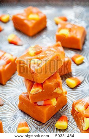 Delicious butterfinger fudge with candy corn and peanut butter